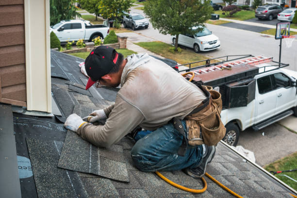 Professional Gutter Repair And Installation technician working in Mc Callsburg, IA